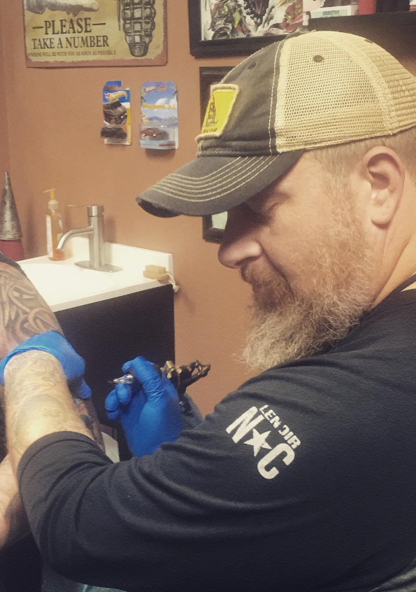 Scott Holding gun
